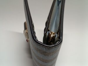 修理後のグッチの財布の折り曲げ部分のコバ