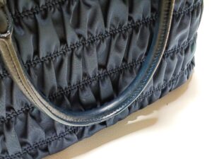 持ち手の破れ修理後のプラダのハンドバッグ