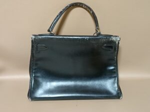 修理前のエルメスケリーバッグ背面