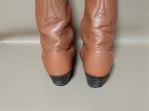 修理後のロングブーツかかと